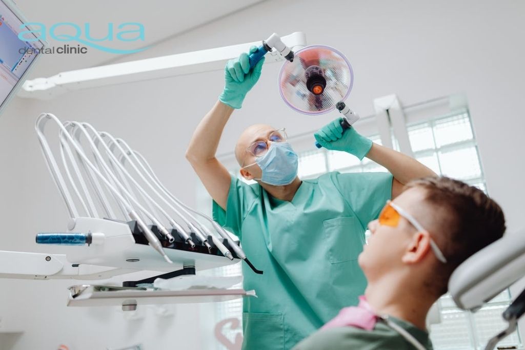image of dentist setting up the surgery